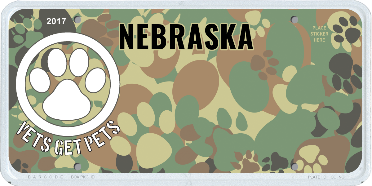 Vets Get Pets license plate. Paw Print camouflage background with a white paw print on the left side of the plate. The words Vets Get Pets are under the paw print emblem