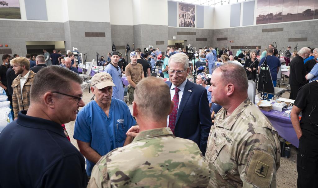 NDVA Director Hilgert, Dr. Craft, Adjutant General MG Strong, Lt. Governor Kelly, and NENG CSM Krecklow discuss the VETMOM during the Lt. Governor's tour.