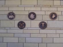 Emblems on stone wall