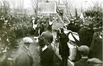 Lowering the stone into place at the cornerstone ceremony of the third Nebraska State Capitol on November 11, 1922.