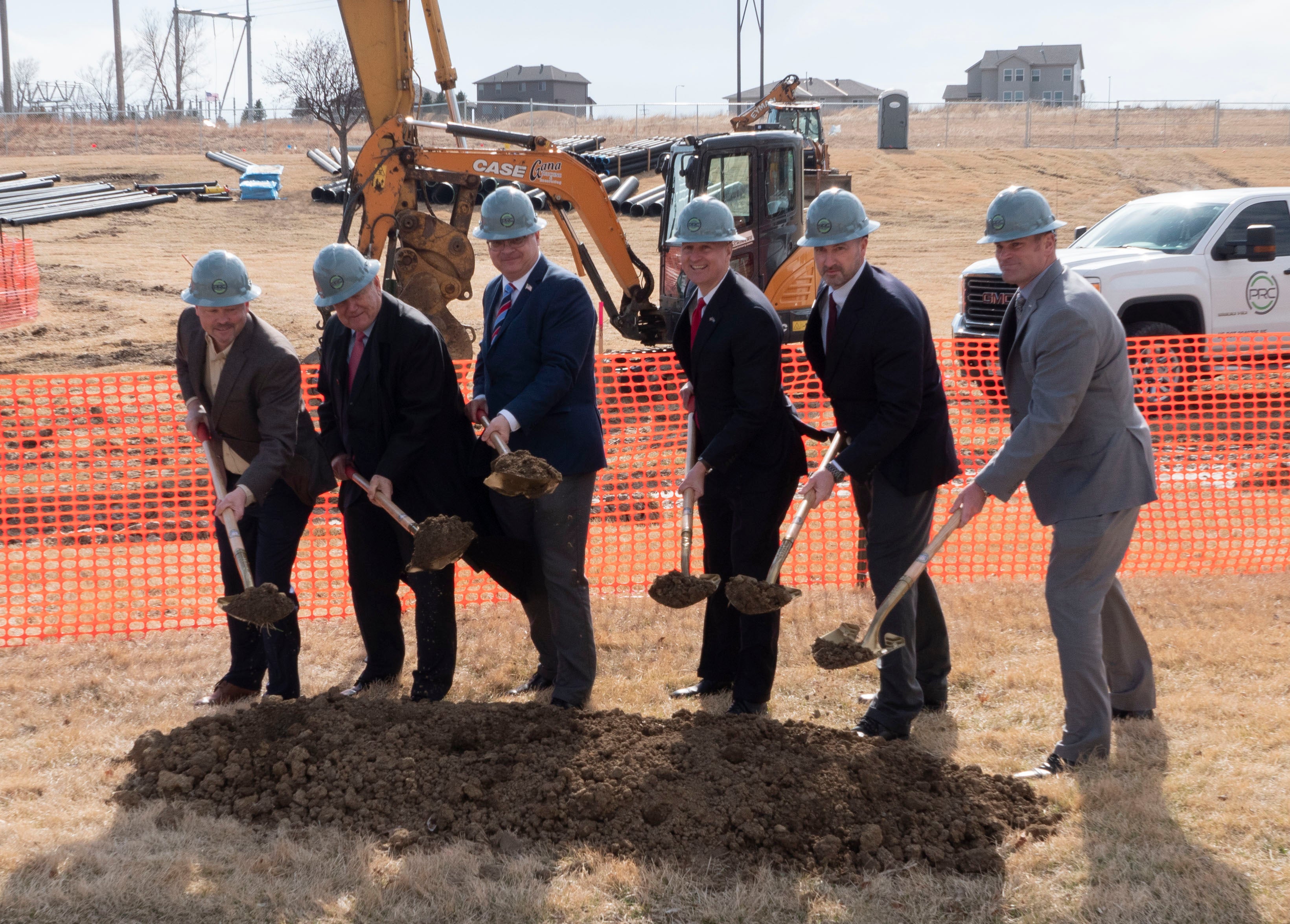 Breaking ground for the facility expansion, from left to right, are Perry Reid President and Partner Ben Velinsky, Veterans Homes’ Board Chair Jim Cada, NDVA Director John Hilgert, Governor Pete Ricketts, ENVH Administrator Matt Bauman, and DAS Director Jason Jackson. 